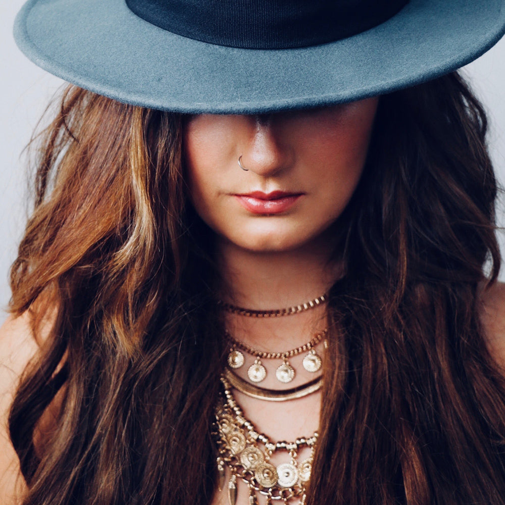 bohemian layered necklaces on jewelry model